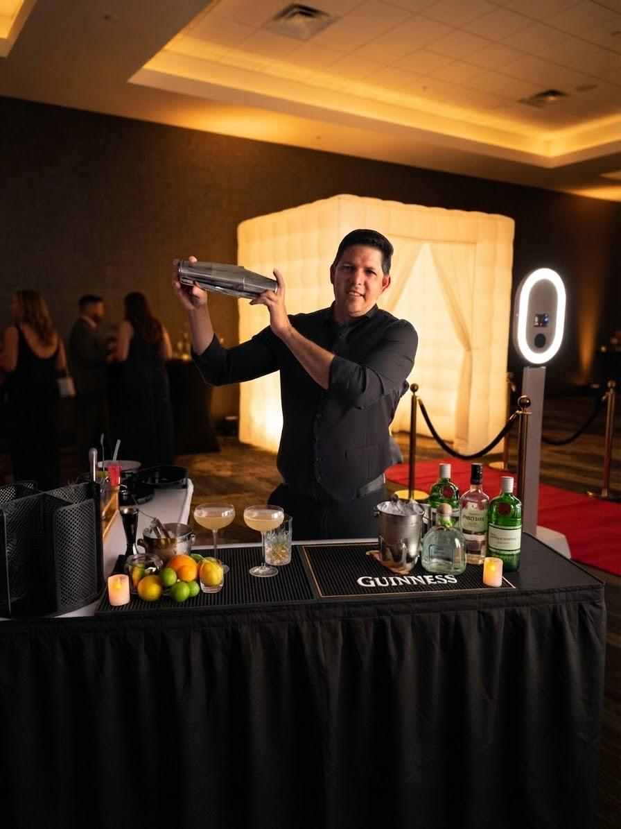 Professional bartender serving drinks at a Golden Moments event